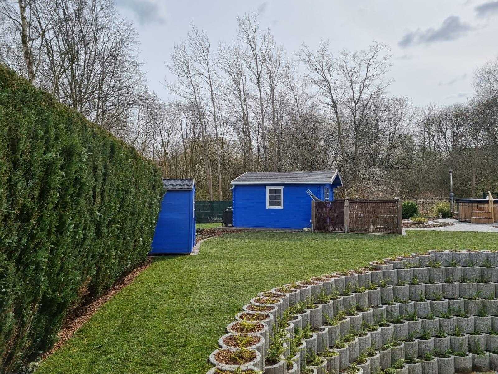 Gartengestaltung mit Gartenhaus und Hochbeet – Flensburg